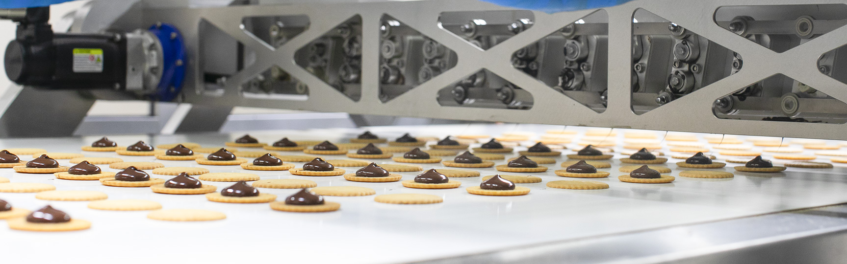 Three Dewey's employees manufacturing cookies